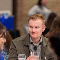 people talking at luncheon table photo 3